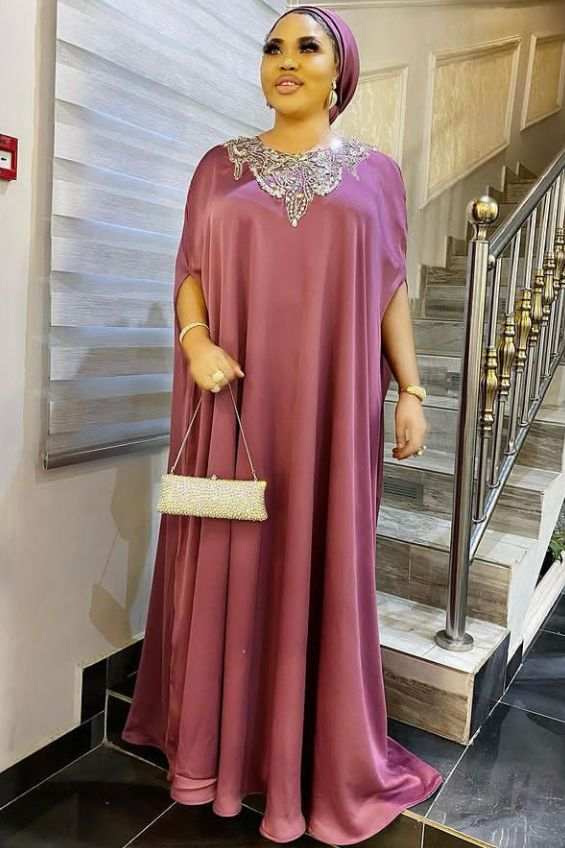 Latest maxi gown material styles for Ladies